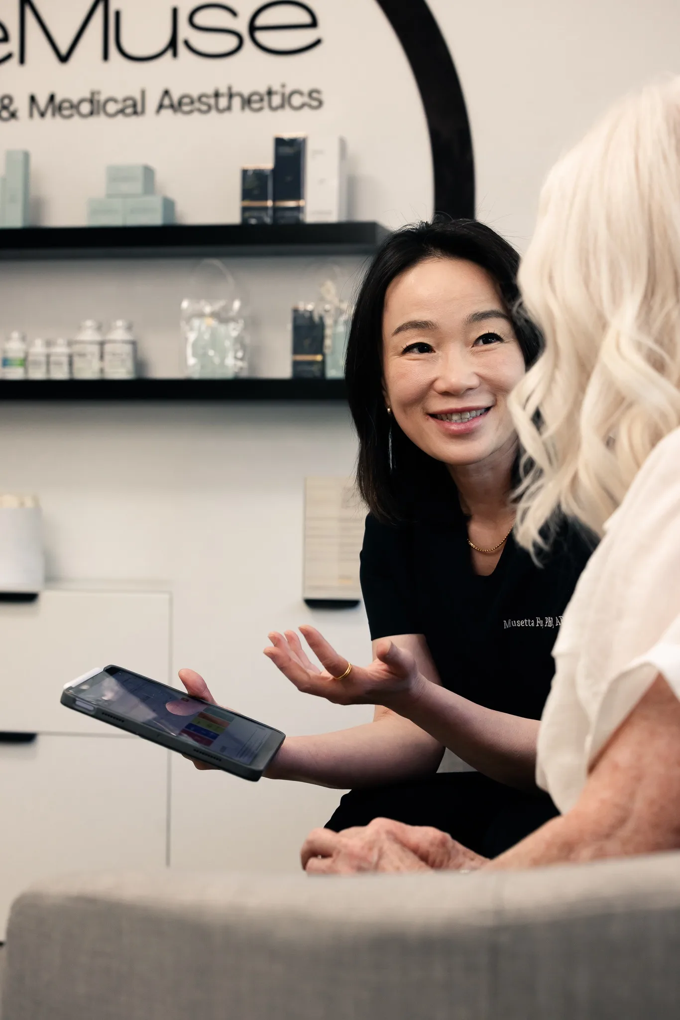 Business owner consulting naturally with a client