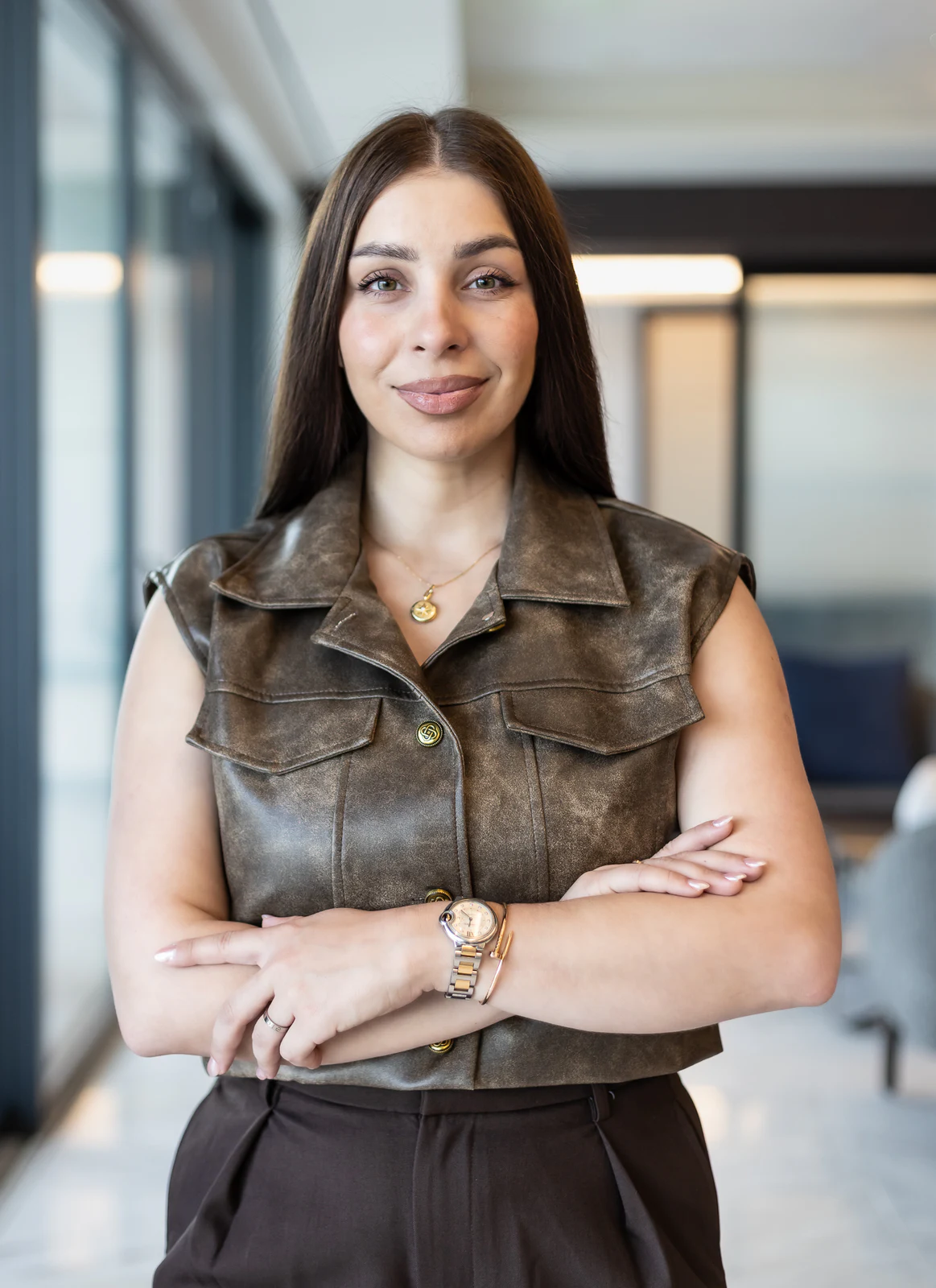 Confident environmental headshot in a modern office