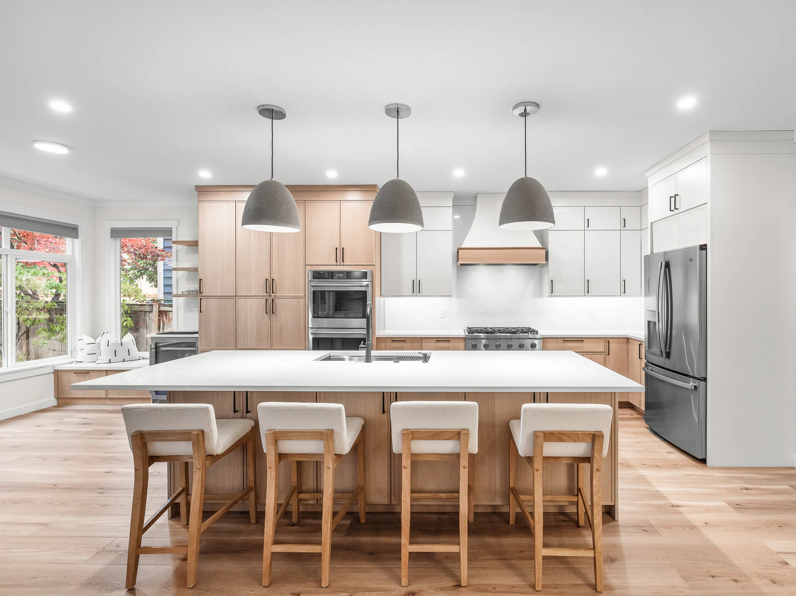 Bright remodeled kitchen with a large white island