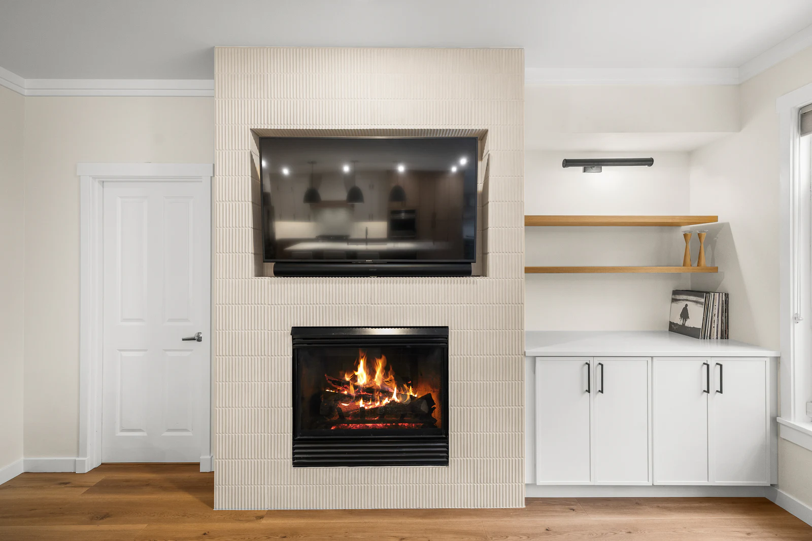 Minimal fireplace wall with built-in storage
