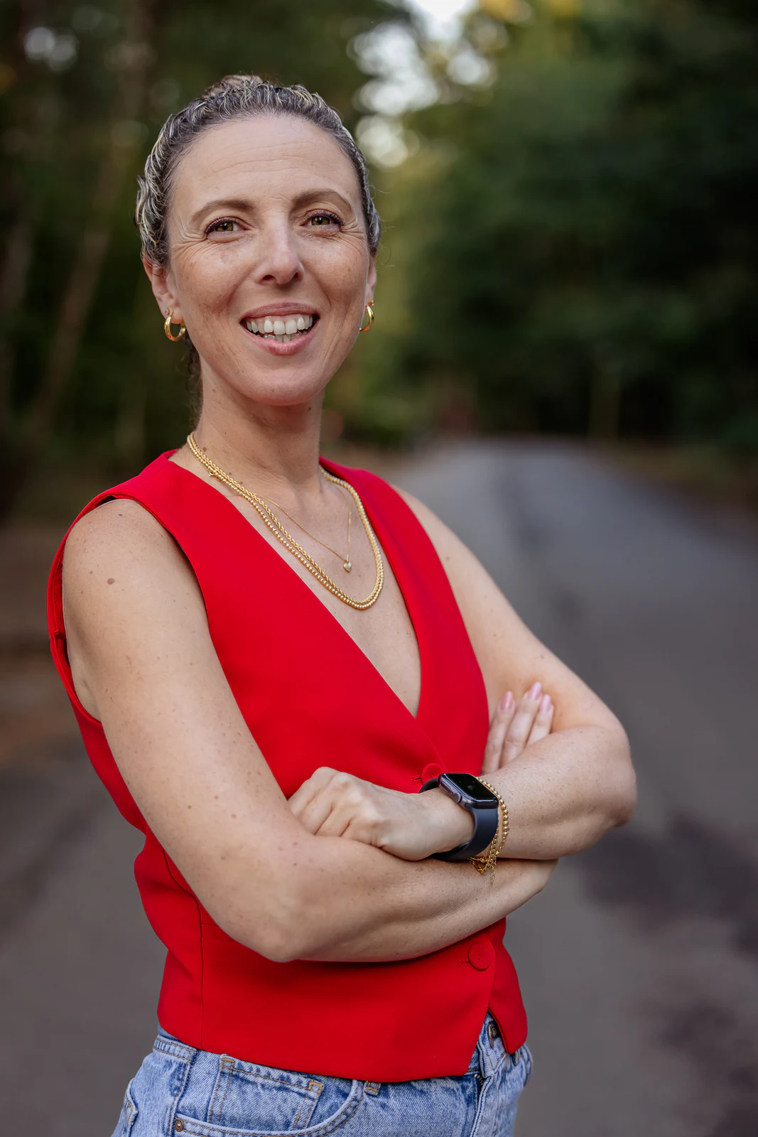 Outdoor portrait in a vivid red top